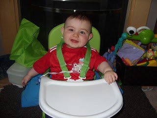 A small child sitting on a chair