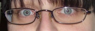 A close up of a person wearing glasses