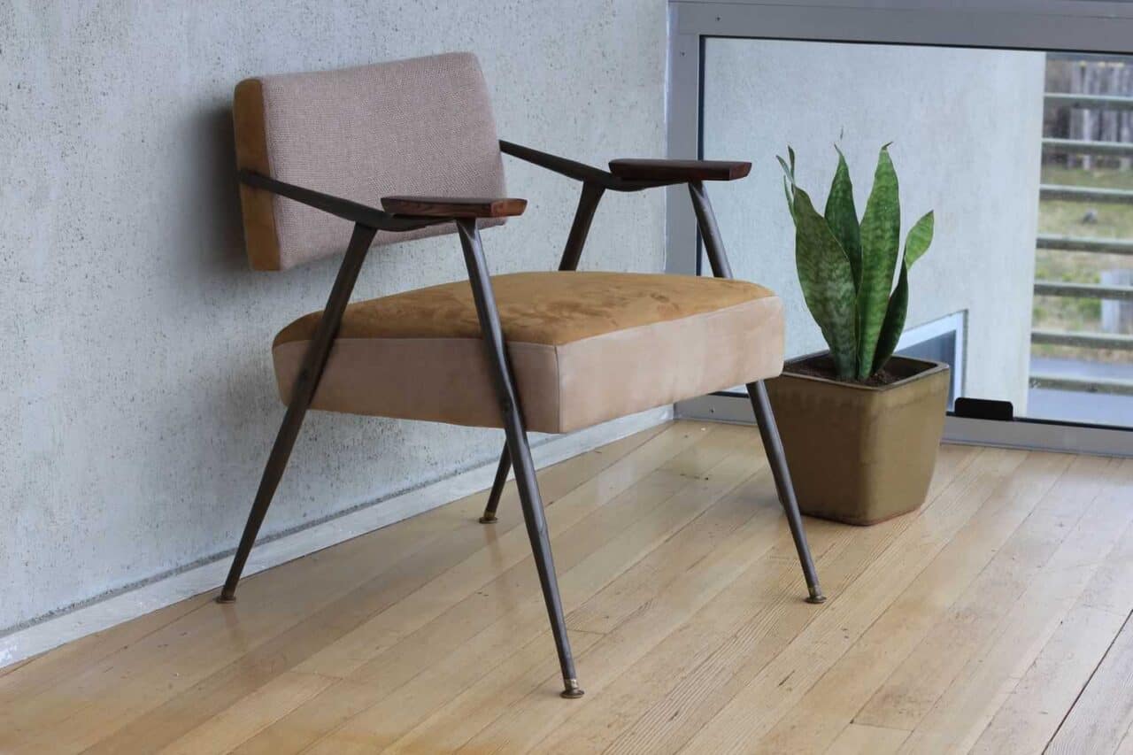 A chair sitting in front of a wooden table