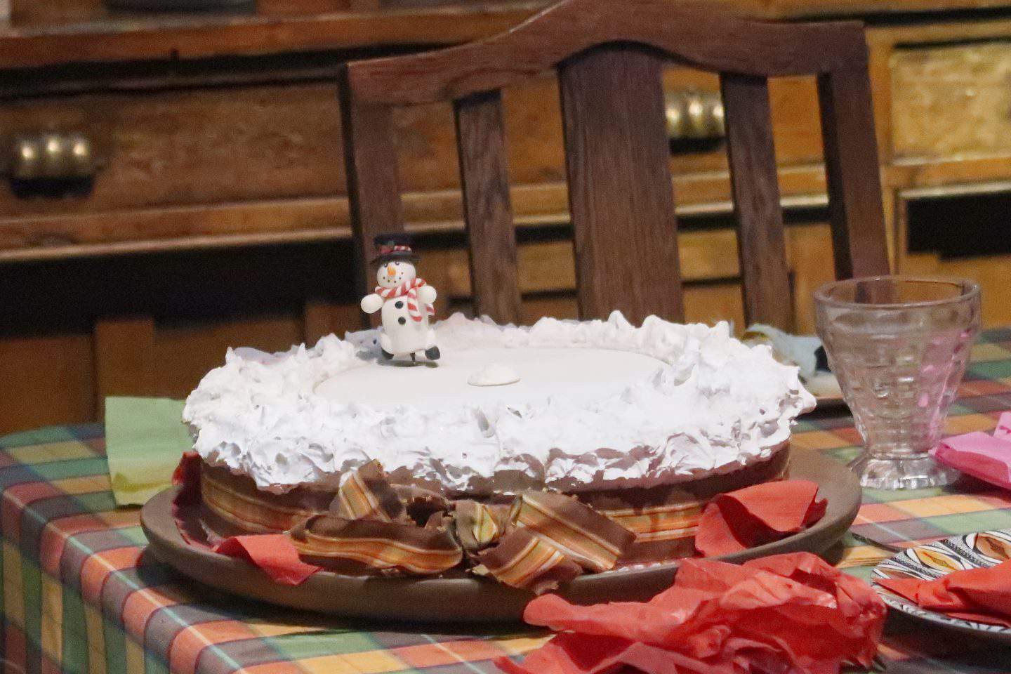 A cake sitting on top of a wooden table