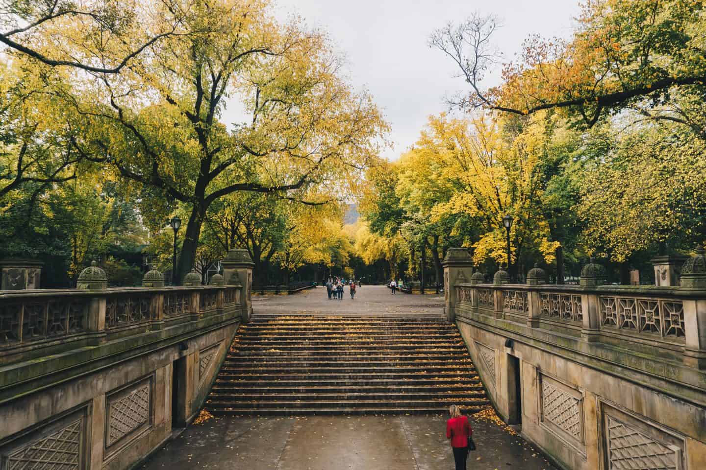 A group of people walking on a bridge