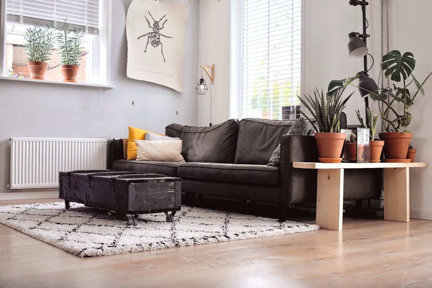 A living room filled with furniture and a large window