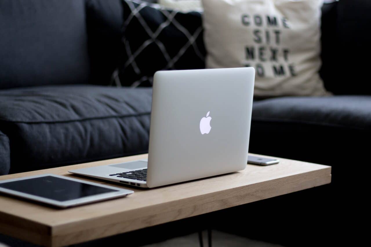 A laptop computer sitting on top of a table