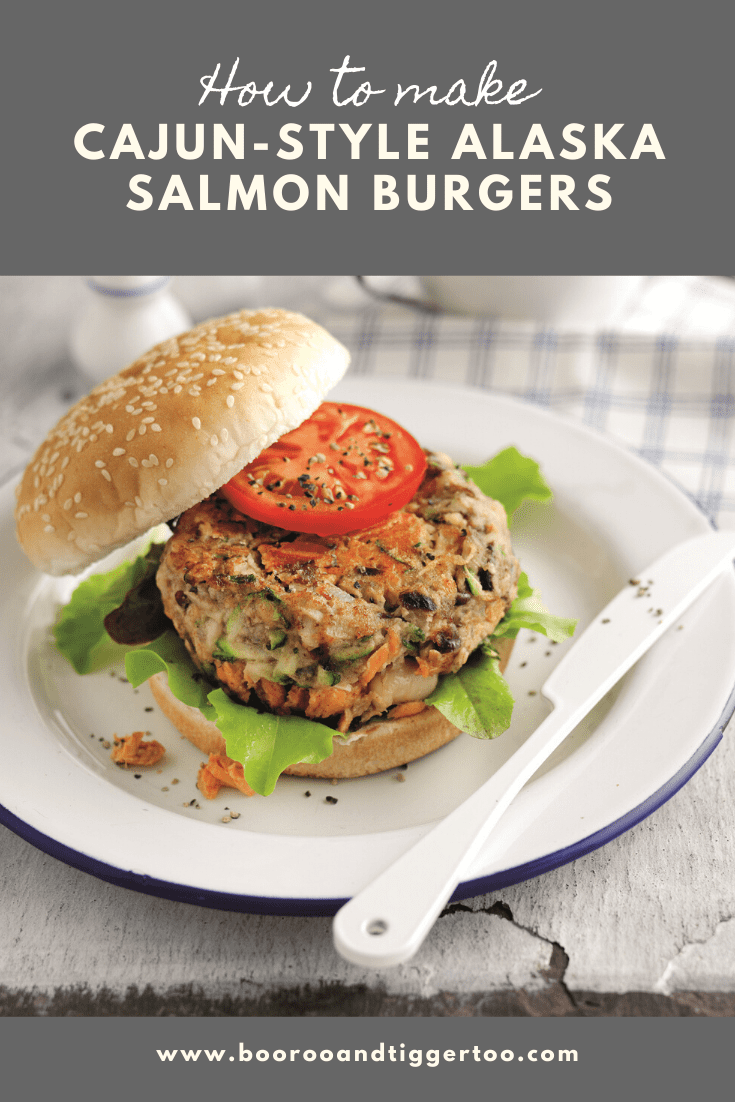 A sandwich on a plate, with Salmon and Salmon burger