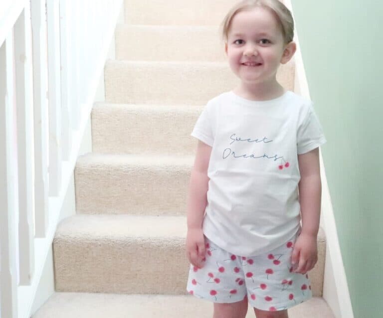 A little girl posing for a picture