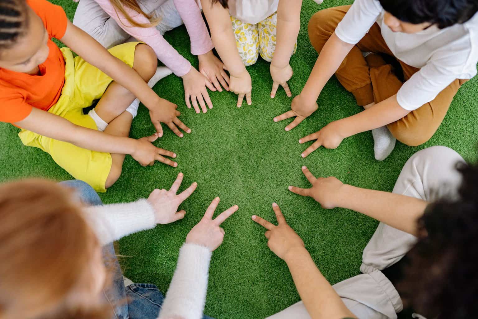 8 Ways To Make Learning Fun For Your Little Ones - group of children playing on green grass