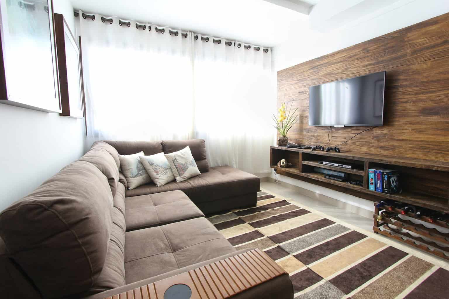 How to Find Privacy In A Ground-Floor Apartment - brown fabric sectional sofa