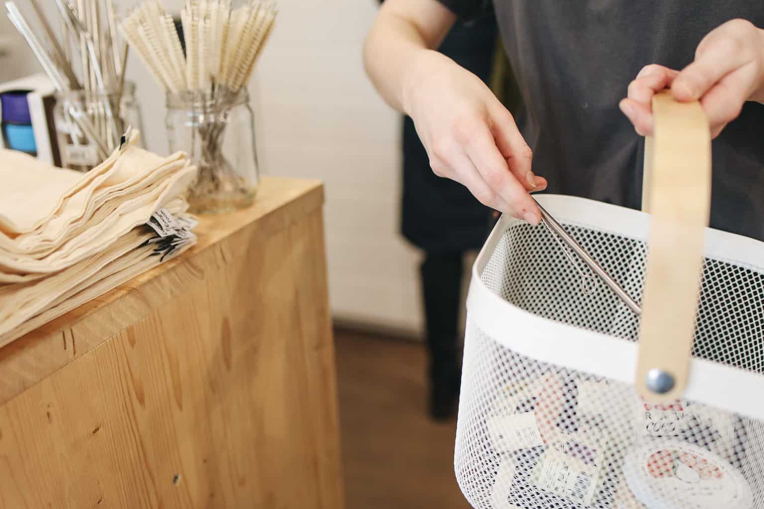 Great Ways to Start your Sustainable Lifestyle Journey - person holding white plastic basket