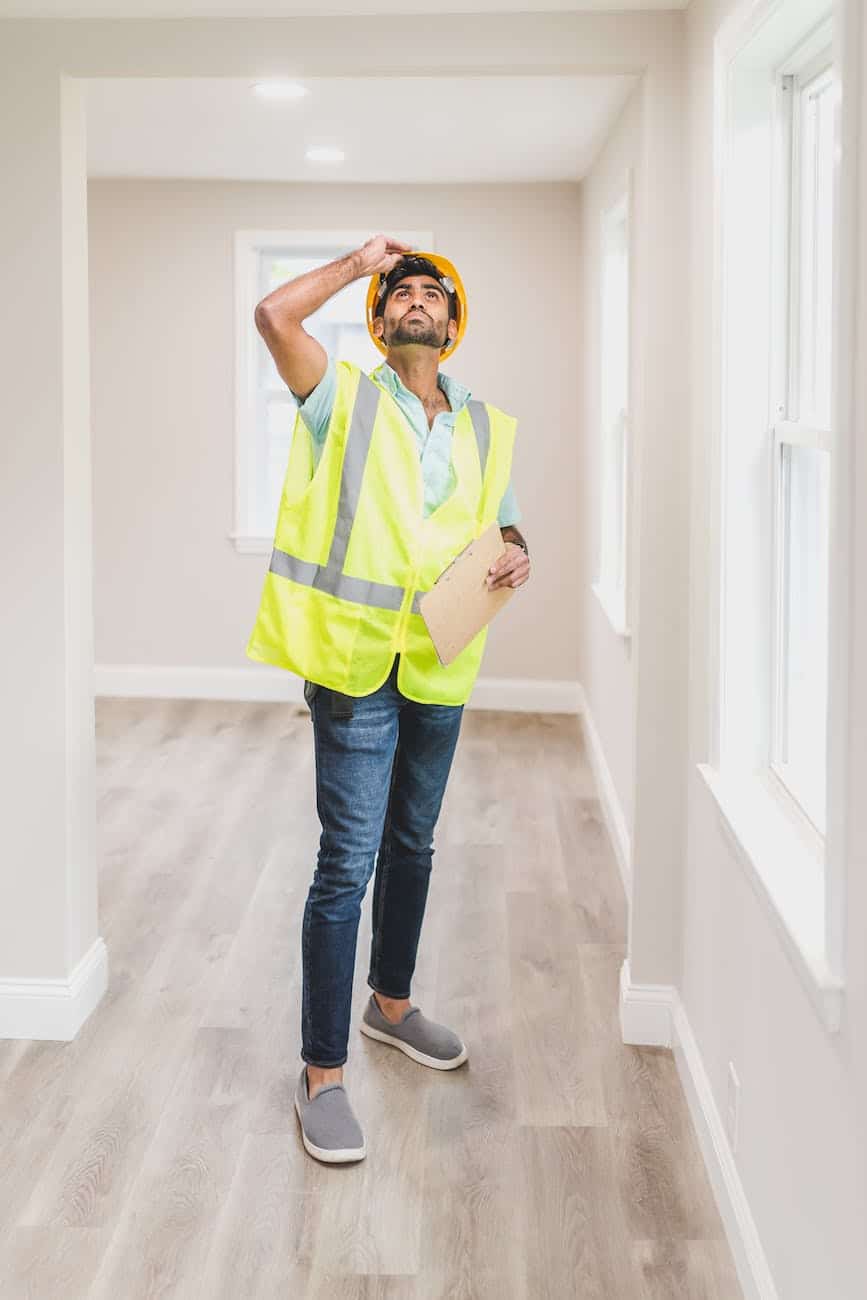 Keep These Five Things in Mind When Hiring a Home Inspector - a man inspecting the house interior