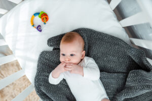 When Can a Baby Sleep with a Blanket?