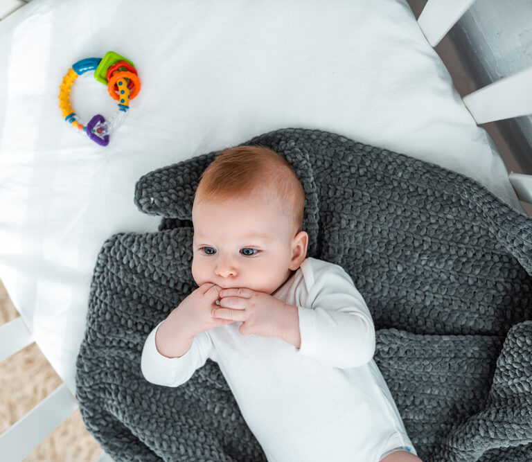 When Can a Baby Sleep with a Blanket?